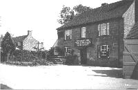 Horsted Keynes, The Crown Inn before its several fires c. 1908.