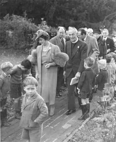 Horsted Keynes: The Queen walks up St. Gile's Church path. Is that you in the foreground?